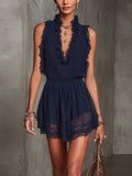 Navy blue pleated chiffon jumpsuit with lace details and ruffled trims