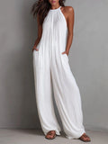Resort-Style Pleated Jumpsuit with Open Back and Wide-Leg Design